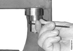 Position Tool H with Rubber Bush (6c or 6d) as shown in adjacent picture. Rubber Bush (6c or 6d) Contact Surface Lightly screw on the nut by hand.