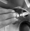 4. Remove all the wheel nuts and take off the flat tire. 5. Remove any rust or dirt from the wheel bolts, mounting surfaces and spare wheel.