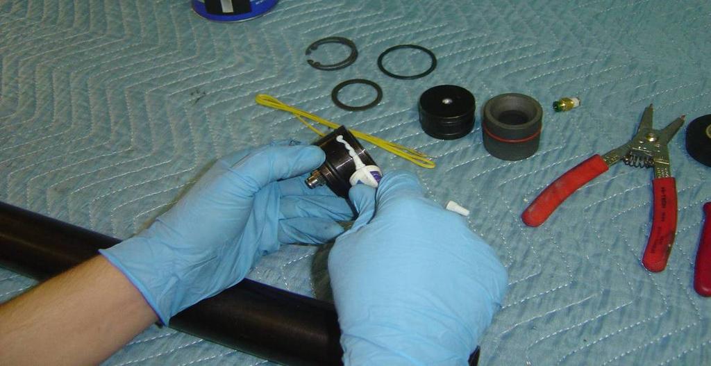 Step 3: Use Krytox grease on top Bulkhead O-rings. Smear Krytox over the entire outer cylindrical surface of the Bulkhead.
