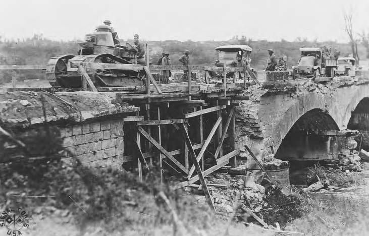 24 TANKS U.S. troops of the 27th Division training near Beauquesne on the Somme Front with Renault FT-17 tanks, September 13, 1918. Courtesy of Art-Tech/Aerospace/M.A.R.S/TRH/Navy Historical.