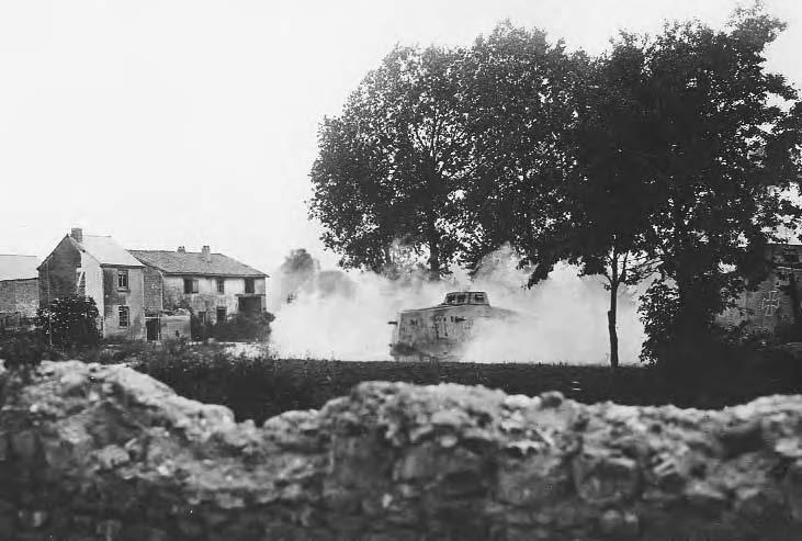 INTRODUCTION OF THE TANK 25 German Sturmpanzerwagen going into action outside a French village, June 1918. Courtesy of Art-Tech/Aerospace/M.A.R.S/TRH/Navy Historical.