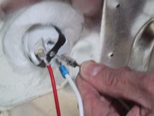 If necessary use ring terminal adapter provided. 6. Remove the white wire to the oven light.