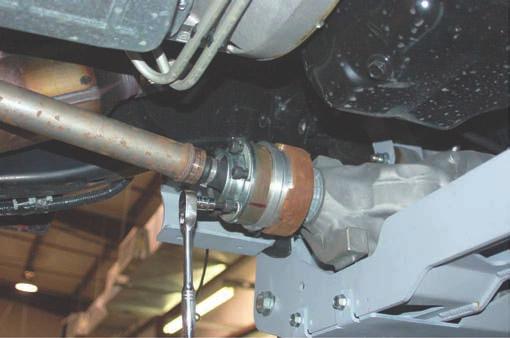 45. Install the drive shaft spacer with supplied 10mm x 85mm hardware. See Photo 37. Tighten using a 8mm allen wrench. 46.