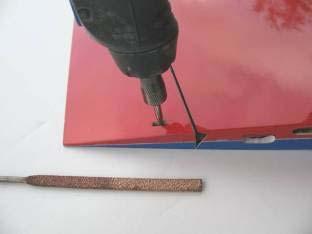 Use a 1/16 carbide cutter to make a slot in the control surface as indicated by the pen mark.