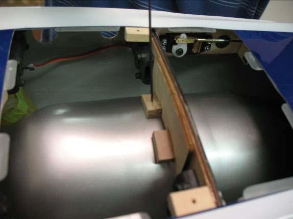 Use #80 grit on the poly ply and inside edge of the fuselage and hatch to thoroughly scuff the surfaces.