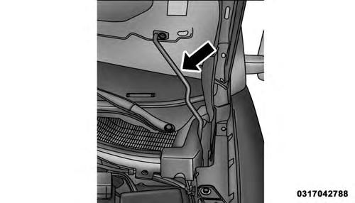 3. Raise the hood and place the hood prop rod in hood slot to secure the hood in the open position. NOTE: Be sure to disengage the rod and secure it in close position before closing the hood.