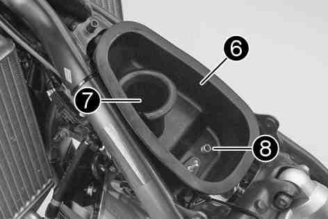 Under no circumstances should dirt enter into the fuel line. Dirt in the fuel line will clog the fuel injection jets.