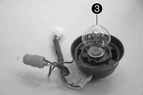 ELECTRICAL SYSTEM 75 Press headlight bulb into the lamp socket lightly, turn it counterclockwise all the way, and pull it out. Insert a new headlight bulb. Headlight (S2/socket BA20d) ( p.