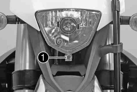 ELECTRICAL SYSTEM 76 15.11Adjusting the headlight range 100827-10 Check the headlight adjustment. ( p. 75) Adjust the headlight range by turning adjusting screw.