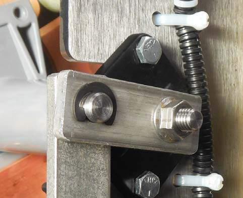 26. Place the self-locking nut onto the reversing segment shaft and tighten with a 9/16" wrench.