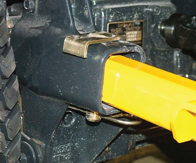 GENERAL OPERATION Receiver locking pin shaft cannot slip off. Carrier arm Drive shaft lock collar PTO shaft Tool bar Hair pin.