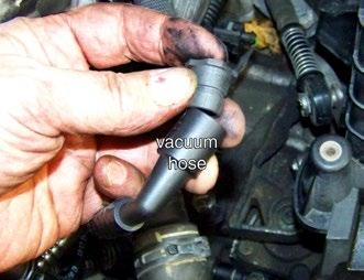 Cautions and Assembly Notes: If the rubber sealing grommet at the vacuum pump hose sticks on the pump nipple,
