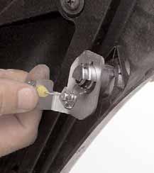 Remove the two 10mm bolts from the subframe, using a 10mm socket wrench (Figure 21). Discard bolts. 5.