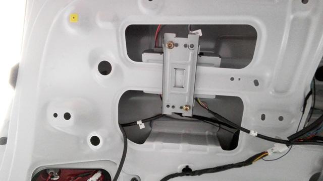 Route the liftgate motor wire harness along the factory wiring harness and connect to the main control module. Secure with cable ties as necessary.