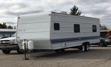 INGHAM COUNTY AUCTION - ITEM #21 1997 Gulf Stream 30 Travel Trailer Dept: A/C Color: White / Blue stripes