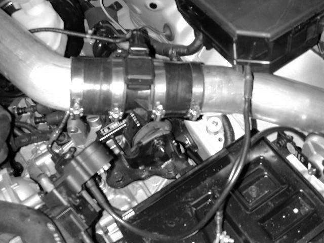 Install the second 3 coupler onto the lower intake pipe and secure in place using