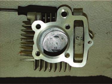 14. Piston Installation: Install one of the provided piston clips onto the piston.