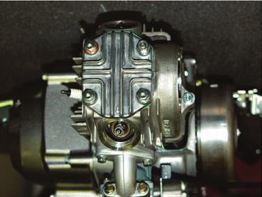 Cam Sprocket In stal - la tion: When installing the cam sprocket make sure that the T on the fl ywheel is still lined up with the mark on the engine