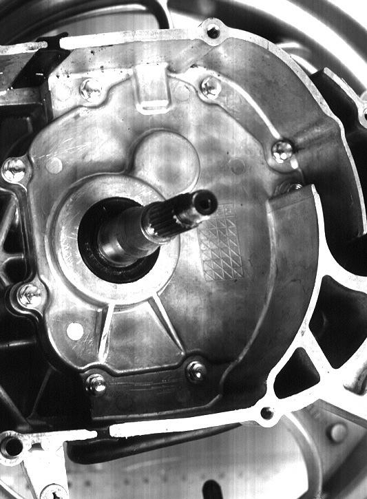 Transmission Loosen the drain bolt and remove the transmission oil. Remove R. crank case cover.
