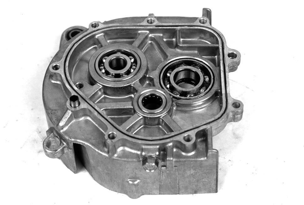 Bearing inspection Manually turn the bearing inner race installed inside the transmission cover, and check if the race is turning smoothly. Verify the outer race is accurately installed in the case.