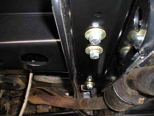 To the RHS of the vehicle, fit 2 x M12 x 1.75 x 50 ( coarse thread ) bolts, spring washer and flat large gold coloured washer to the most forward hole.