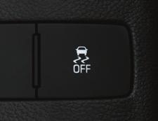 Press the + (plus) or (minus) button on the side of the shift lever to upshift or downshift. The current gear will be displayed on the Driver Information Center.