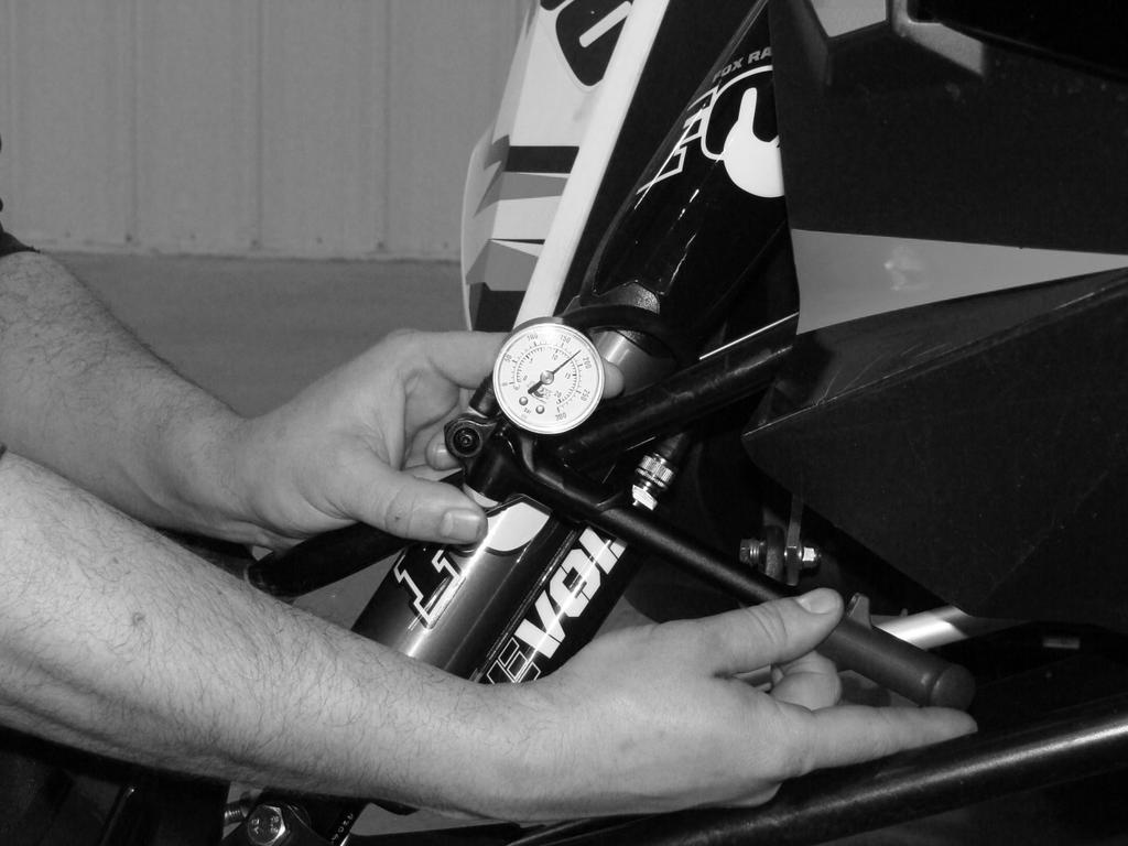 FLOAT 3 EVOL SERIES SETUP Step 1 Ensure that your snowmobile is safely supported with a floor jack or jack stand and the skis are off the ground. Remove the EVOL air spring filler cap.