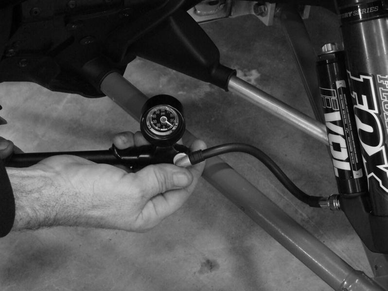Step 4 Thread the pump onto the MAIN air filler valve until it is fully seated and air pressure registers on the pumps low pressure scale. Step 5 Pump the shock up to the desired air pressure setting.