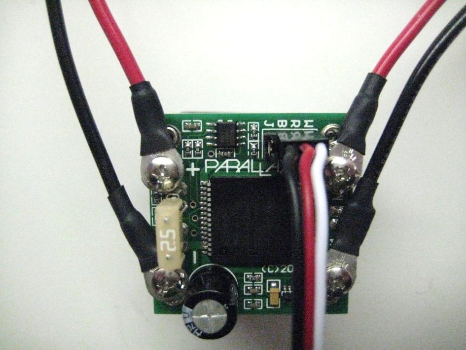 10. Connect the 5 black and red wires from both HB-25 motor controllers to the center wire terminal block as shown at right. 11.