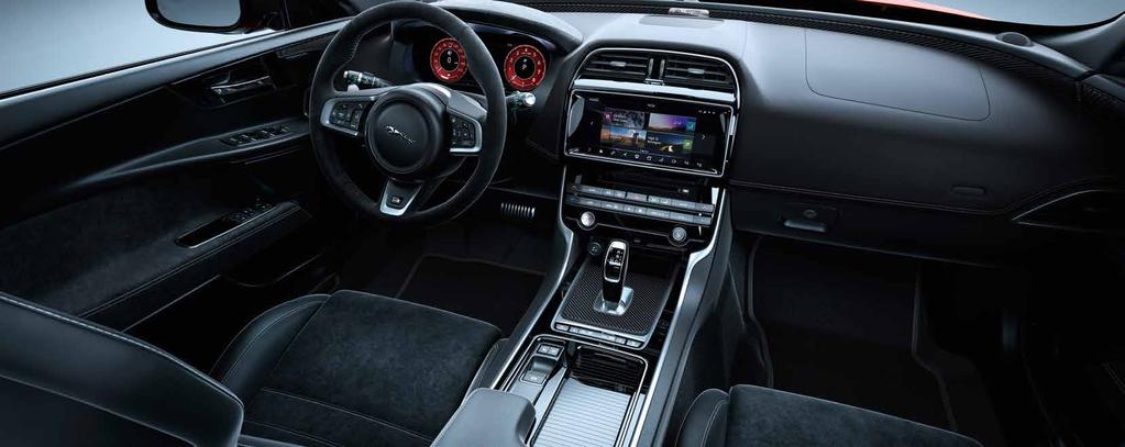 A CABIN THAT GRABS YOU The new magnesium-framed Performance or optional Carbon Fibre racing seats are designed to grip you tight, so you're 'at one' with the car when driving hard.