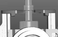 corresponds to the valve fork top surface being even with the top edge of the raised cylinder.