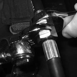 Hand tighten swivel hex fitting until it is snug then take an in-lb torque wrench with a 3/4 crows foot, set to 125 +/- 5in-lbs, to torque the connection down.