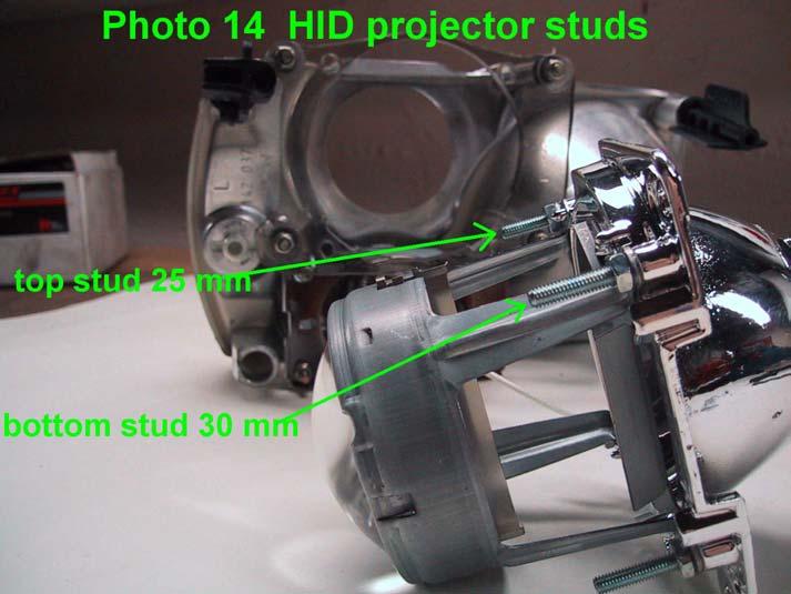 3. Remove the HID projector lens frame mounting screws and replace with 25 mm long (top) and 30 mm long (bottom) M4 x 0.