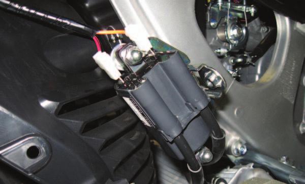 I 14 Unplug the ORANGE wire from the ignition coil and plug the set of GREEN colored