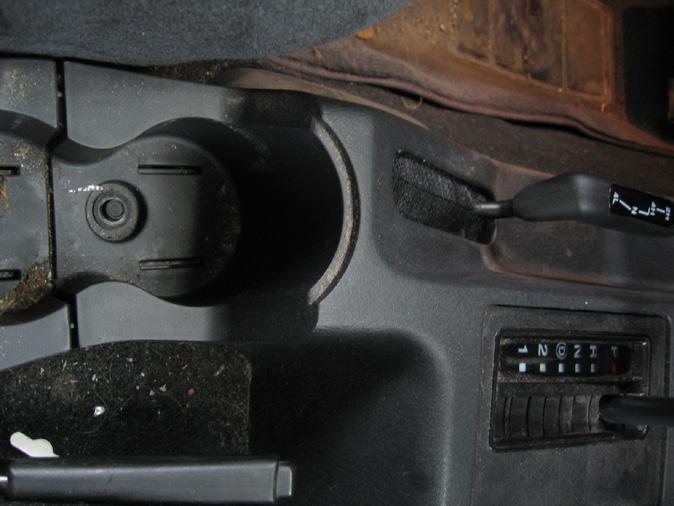 Depending on console style, you may have up to five bolts securing the console. Two piece consoles only require removal of two or possibly three bolts.
