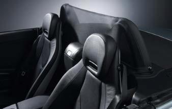 wheel Available wood trim package Newly-styled handbrake lever Sport seats with Y-shaped piping and magnesium frames