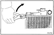 34 in) 2JZGTE 7.7 mm (0.31 in) 5. CAULK LOCK PLATE (a) Lightly press SST against the lock plate in the order shown in the illustration.