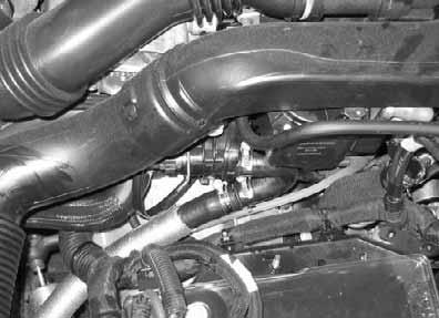 from the heater unit inlet and the 180 bend (1) from the engine outlet with the connecting pipe 18x20mm and hose clamps as shown in the figure