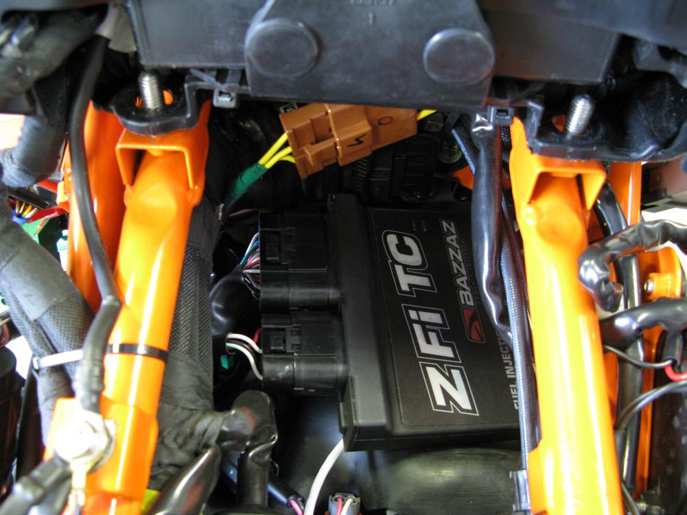 Connect the Bazzaz fuel harness and begin to route the harness towards the air box along the left hand side of
