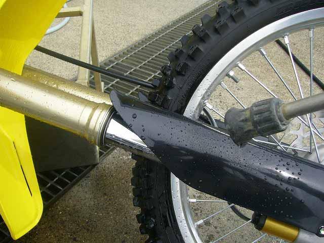 Motorcycle Washing On front fork, high pressure washers may damage