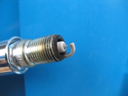 THIS IS A PHOTO OF A GOOD PLUG. PROCEED TO STEP 19. Step 18 THIS IS A PHOTO OF A BAD FOULED PLUG, IF YOU LOOK CLOSELY YOUR CAN SEE THAT IT IS WET AND OILY LOOKING.