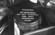 Radiator Pressure Cap Power Steering Fluid NOTICE: Your radiator cap is a 15 psi (105 kpa) pressure-type cap and must be tightly installed to prevent coolant loss and possible engine damage from