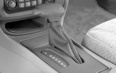 Console Shift Lever (Option) 1. Hold the brake pedal down with your right foot and set the parking brake. 2.