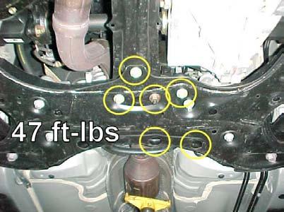 Torque to 47 ft-lbs. 5 Install the 4 nuts to secure the steering rack to the cradle.