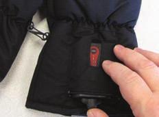 Core Heat Instructions 18 Zippered pocket on glove gauntlet is made to store battery. Plug the mitts into the battery and close pocket. Hold down the power button on battery to turn on mitts.