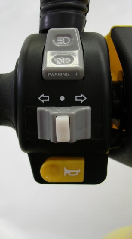 2.3 Left Switch Unit 2.3.1 High Beam switch Position 1: When the low beam is switched on, press the switch down will activates the high beam as long