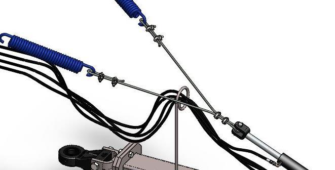 Attach the two ends of the included steel cable through the centering springs using the included cable clamps. Be sure the cable is tight and even on both sides to ensure proper alignment.