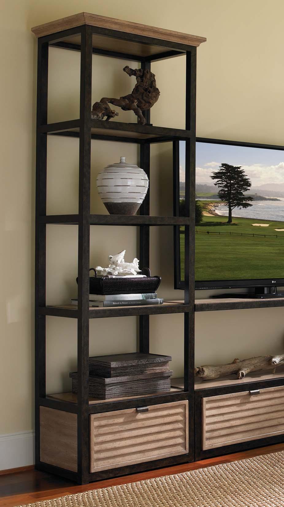 Make a contemporary design statement with this dramatic wall system, comprised of two Camino Real media towers, a 60 drawer unit in the center, and a shelf above it