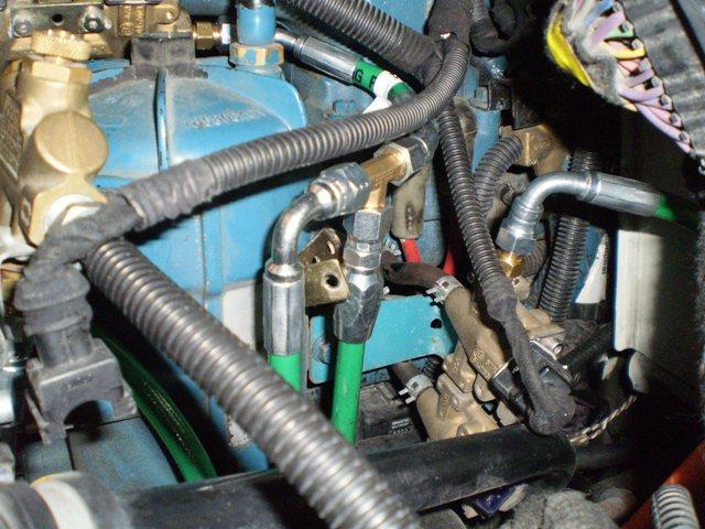 CRITICL PROCESS OPERTION 20 10) LOCTE GREEN CHSSIS SUPPLY HOSE INSIDE THE DRIVER SIDE ENGINE COMPRTMENT 20) LOCTE THE SUPPLY TEE BEHIND THE FUEL FILTER CNISTER (BETWEEN THE MIDDLE FRONT ND MIDDLE RER