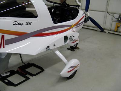 TL-ULTRALIGHT STINGSPORT & STING S3 How To Remove/Replace The Wings The main spar of each wing extends through the fuselage beneath the seats and engages the wing root on the